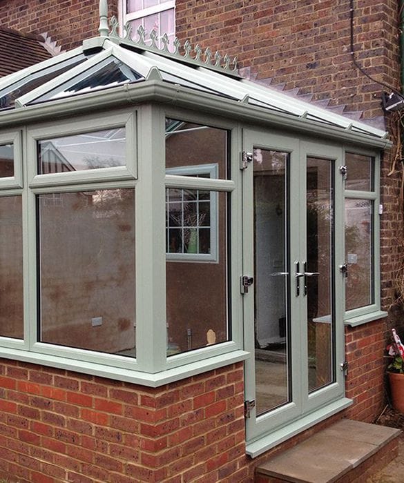 Conservatories in Worthing – green uPVC conservatory installed by Window Mart