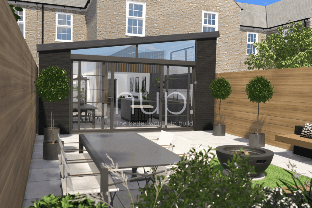 A modern hup extension in Horsham with a dining table, chairs, and round trees in planters. The patio leads to a Hup! extension of a brick house. Wooden fencing and greenery surround the outdoor seating area.
