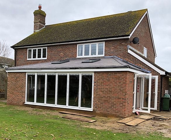 Window styles for Horsham homes on a two-storey brick property