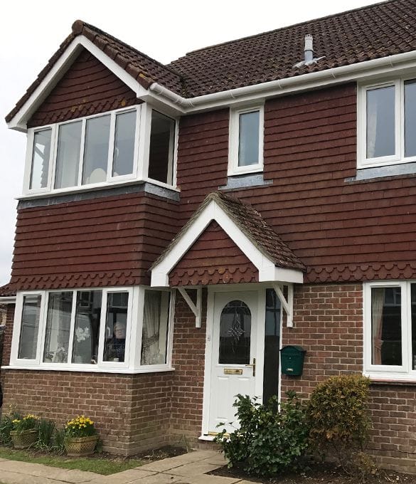 White casement and bay windows fitted to a Horsham home
